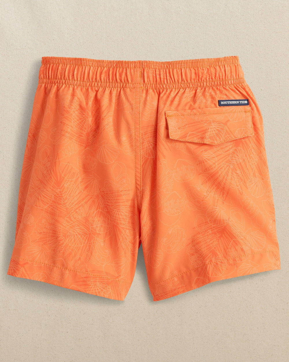 The back view of the Southern Tide Boys Palm-tree-cation Swim Trunk by Southern Tide - Papaya Orange