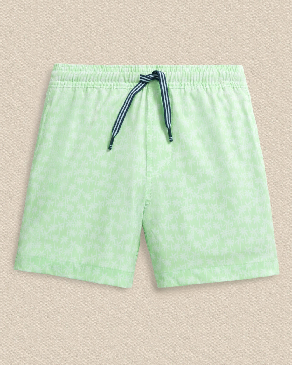 The front view of the Southern Tide Boys Palmy Vibes Maritime Swim Trunk by Southern Tide - Green Ash