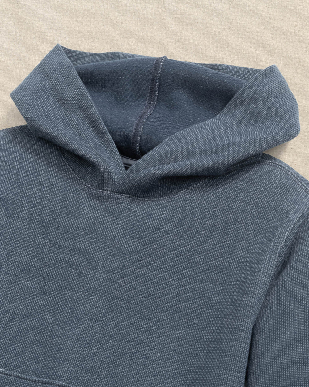 The detail view of the Southern Tide Boys Pearl Cove Fleece Hoodie by Southern Tide - Dress Blue