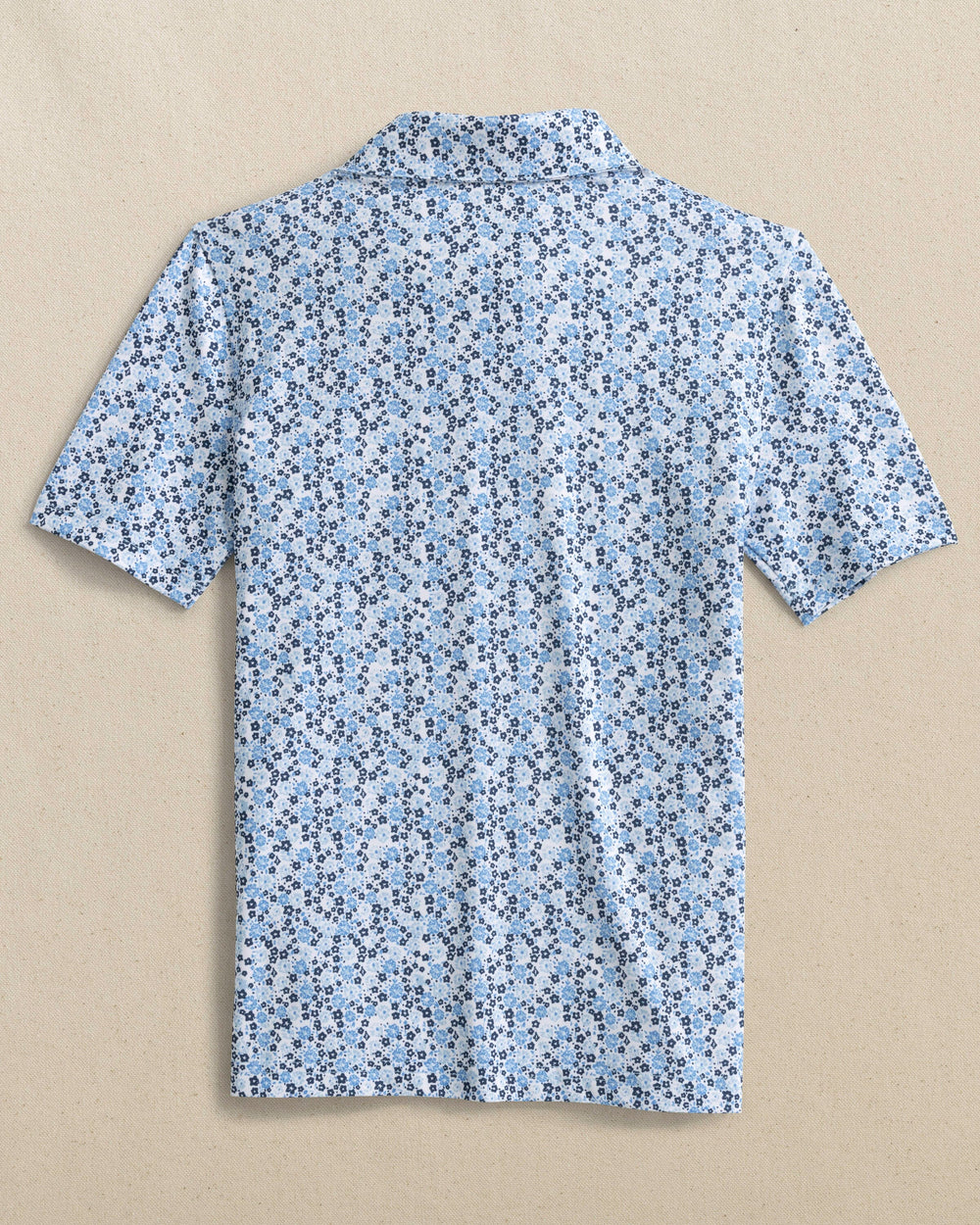 The back view of the Southern Tide Boys Petal Party Printed Performance Polo by Southern Tide - Classic White