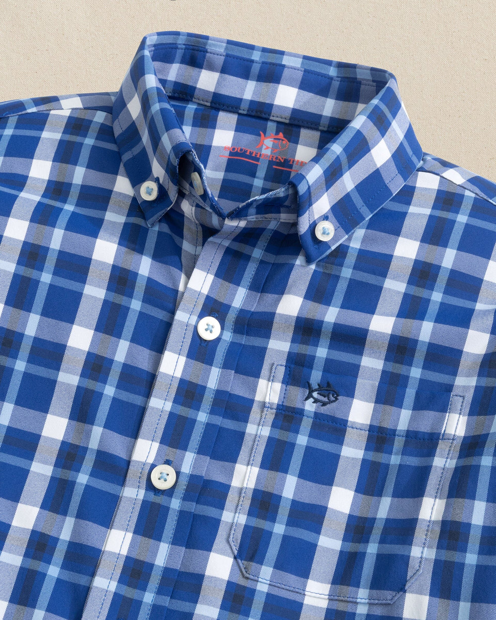The collar view of the Southern Tide Boys River Ridge Plaid Intercoastal Long Sleeve Sport Shirt by Southern Tide - Surf Blue