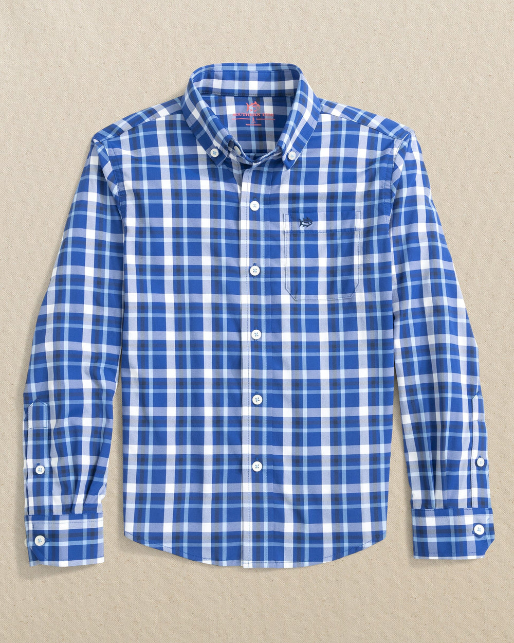 The front view of the Southern Tide Boys River Ridge Plaid Intercoastal Long Sleeve Sport Shirt by Southern Tide - Surf Blue