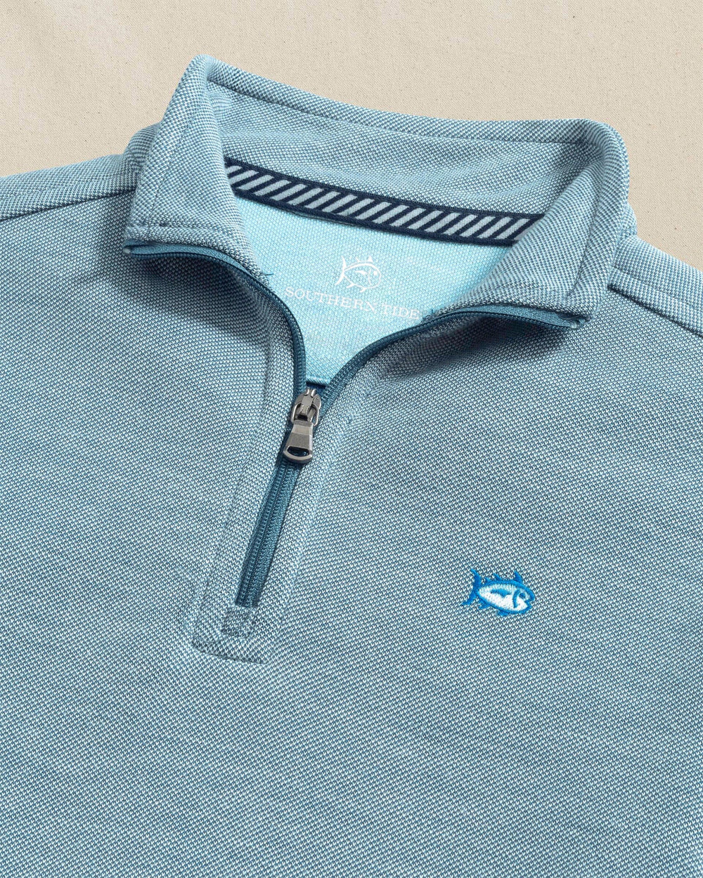 The detail view of the Southern Tide Boys Sandy Cove Quarter Zip by Southern Tide - Nautical Blue
