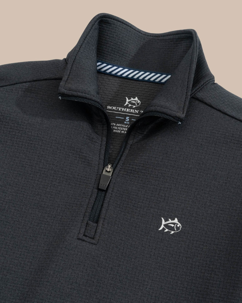 The detail view of the Southern Tide Boys Schooner Quarter Zip by Southern Tide - Caviar Black