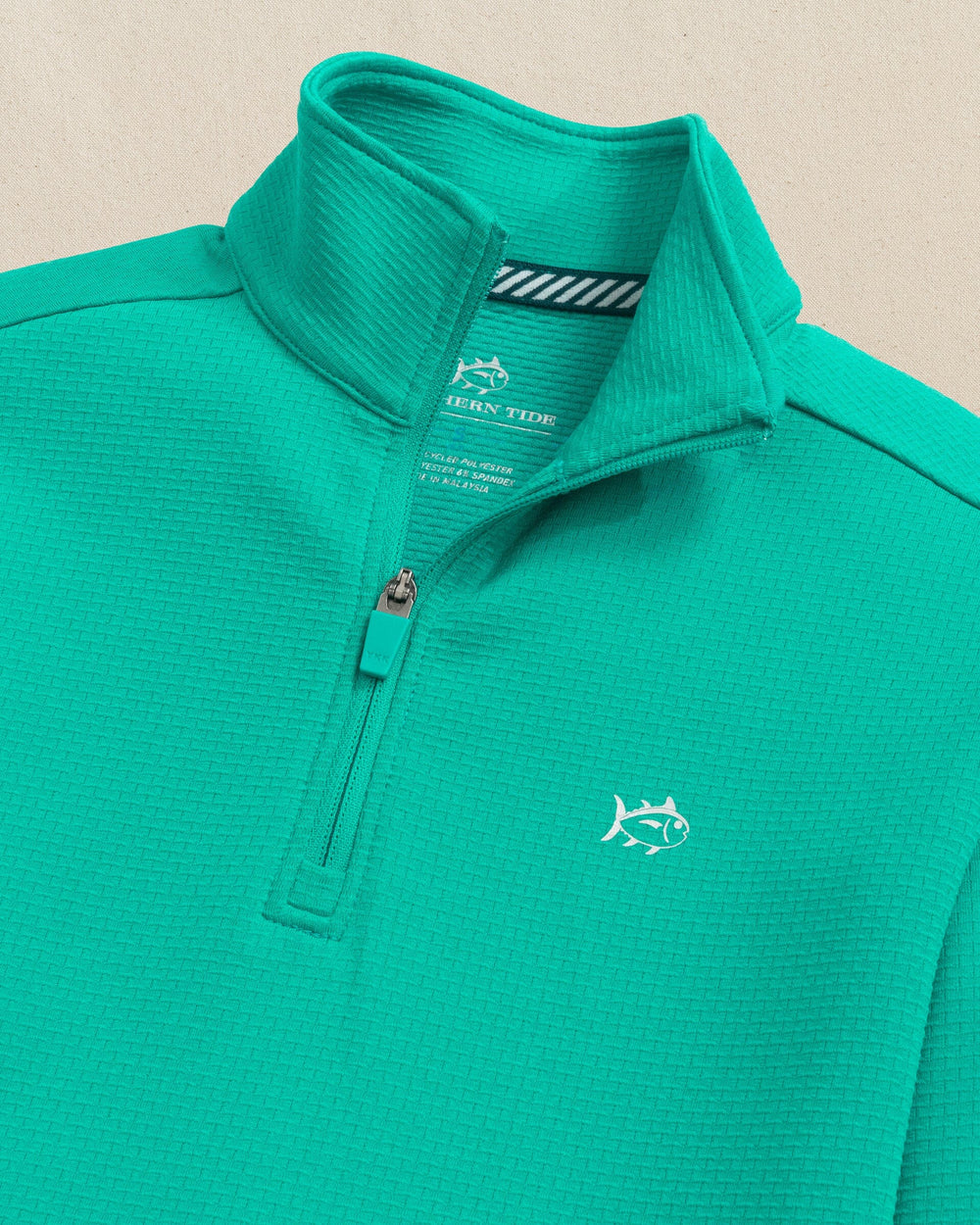 The collar view of the Southern Tide Boys Schooner Quarter Zip by Southern Tide - Spruce Shade