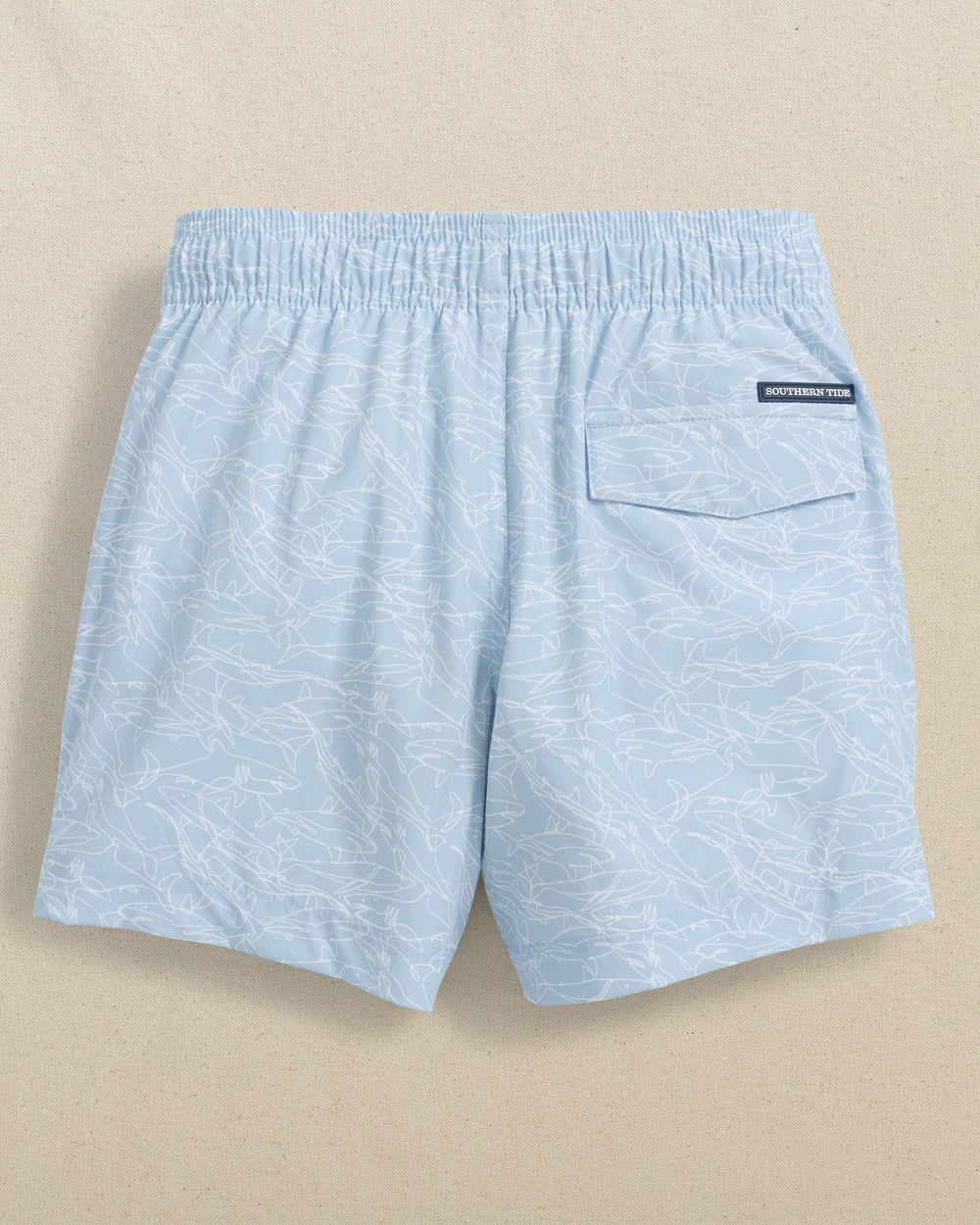 The back view of the Southern Tide Boys Shark Bait Swim Trunk by Southern Tide - Cerulean