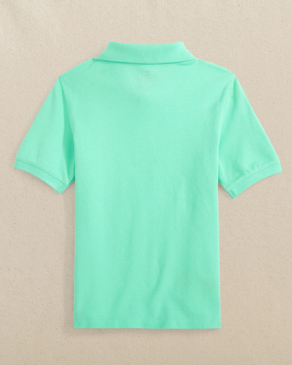 The back view of the Southern Tide Boys Skipjack Polo by Southern Tide - Gulf Shores