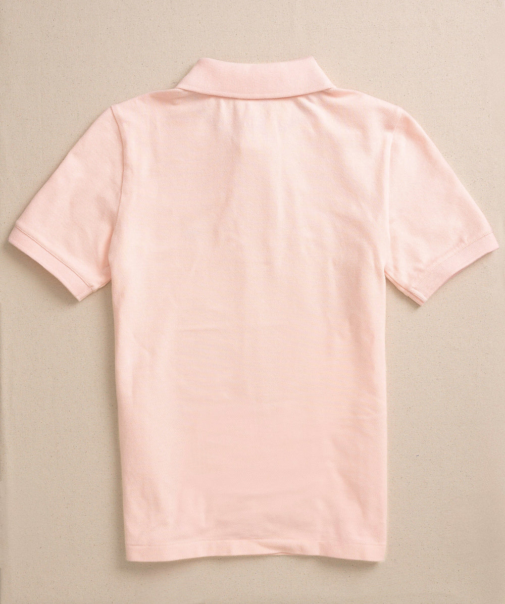 The back view of the Southern Tide Boys Skipjack Polo by Southern Tide - Light Pink