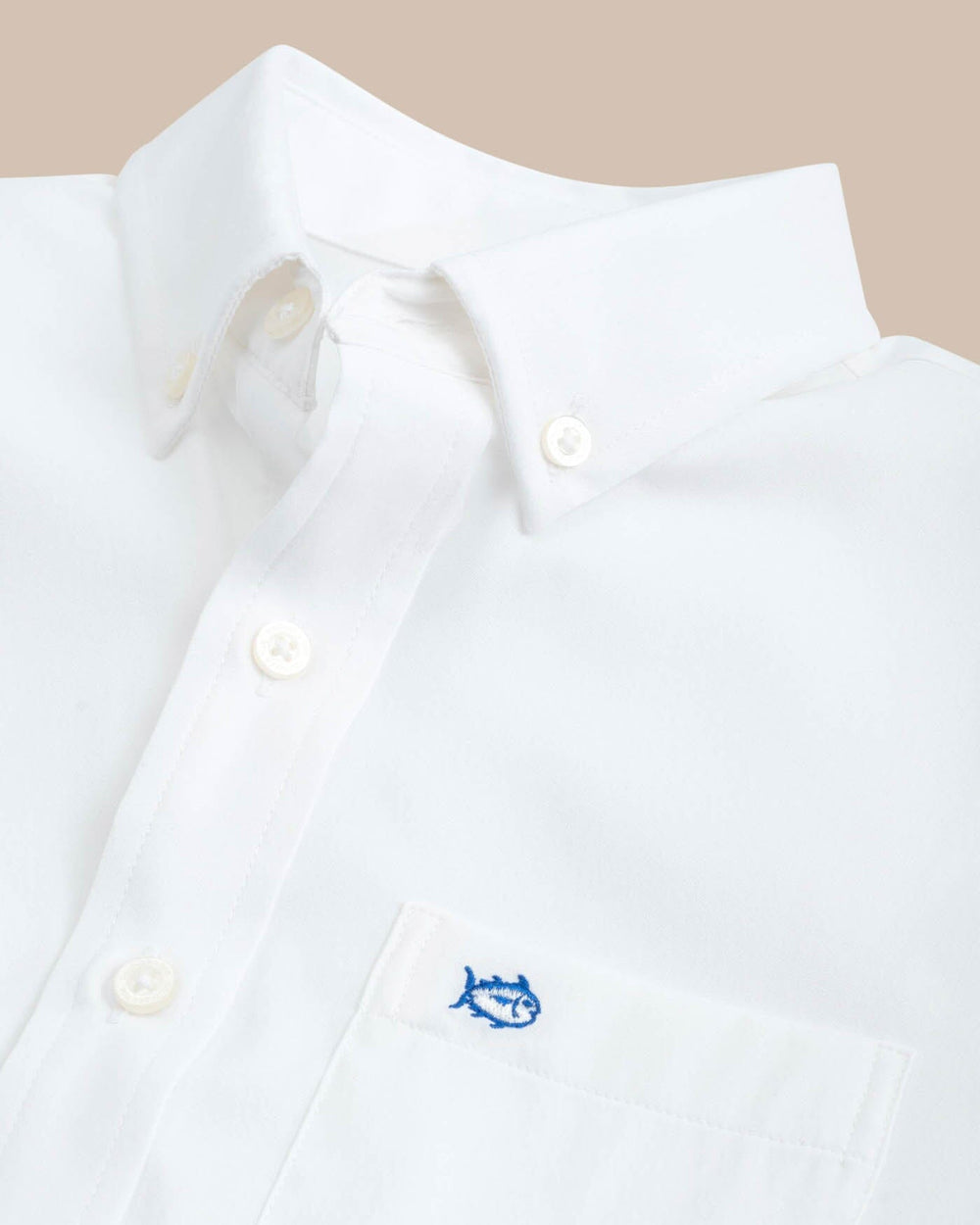 The collar of the Boys Solid Intercoastal Button Down Shirt by Southern Tide - Classic White