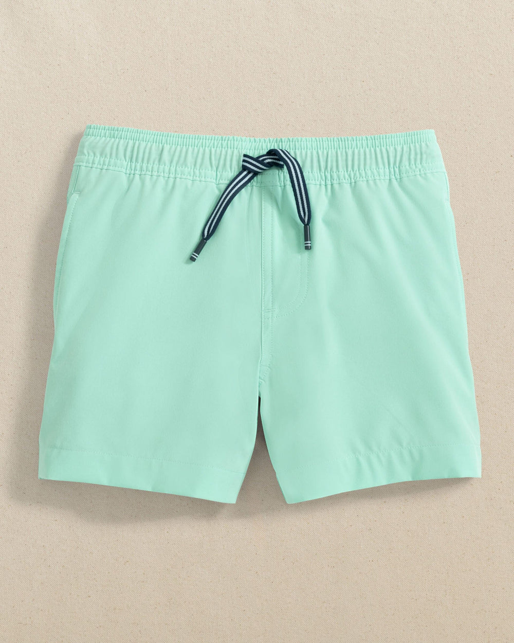 The front view of the Southern Tide Boys Solid Maritime Swim Trunk by Southern Tide - Garden Grove