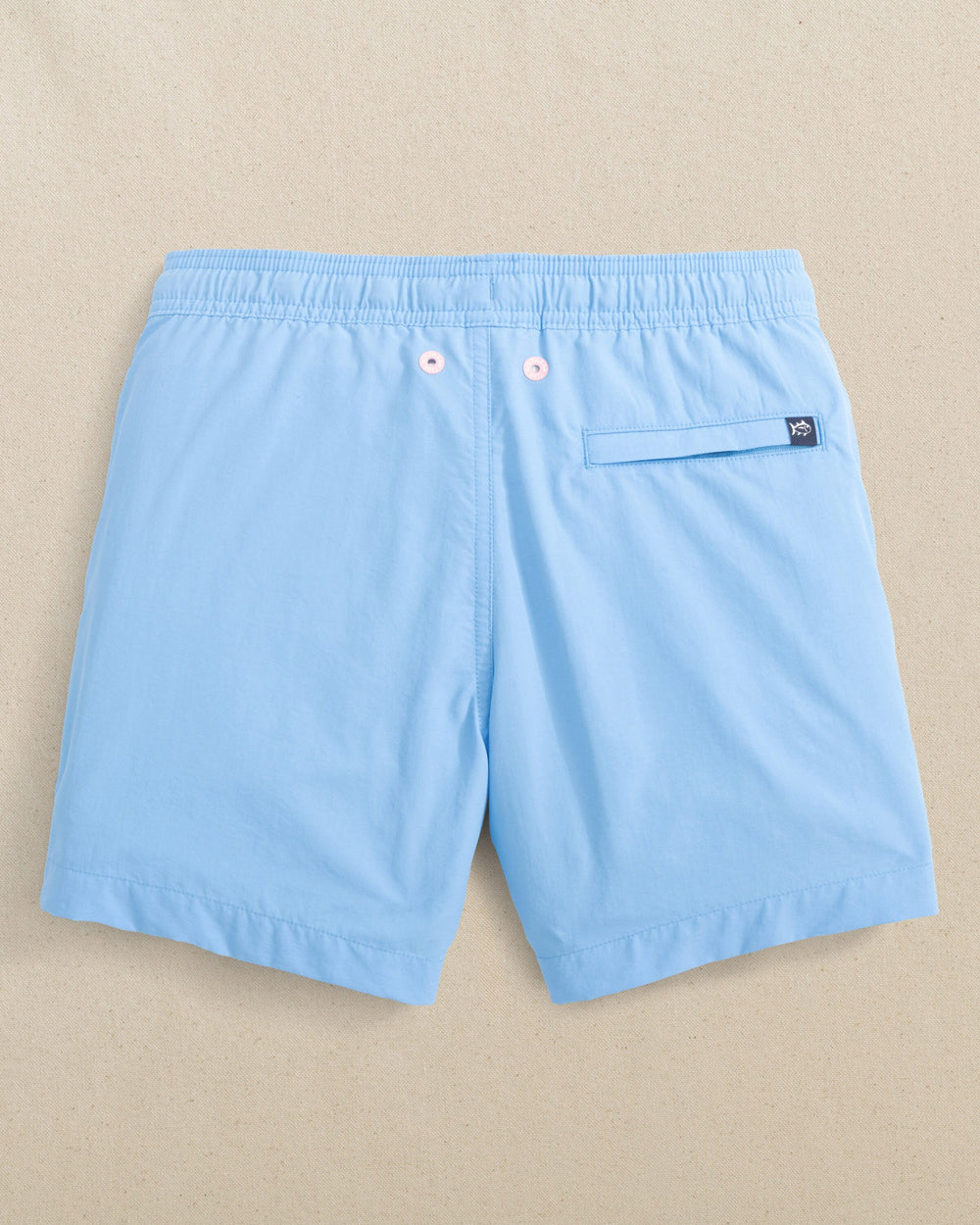 The back view of the Southern Tide Boys Solid Maritime Swim Trunk by Southern Tide - Ocean Channel