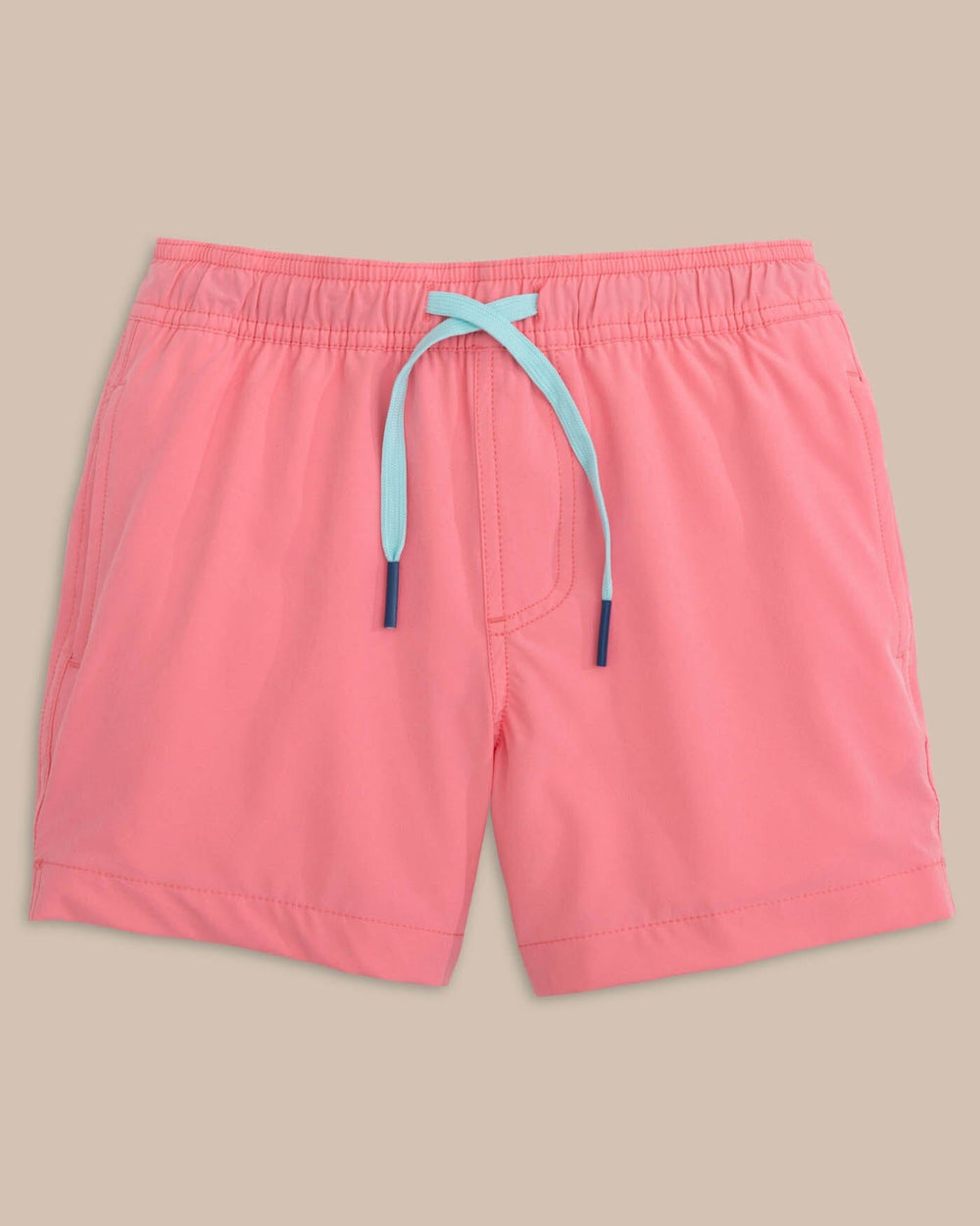 The front view of the Southern Tide boys-solid-swim-trunk-2-1 by Southern Tide - Geranium Pink