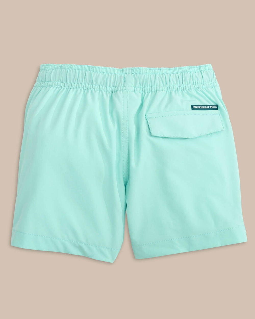 The back view of the Southern Tide boys-solid-swim-trunk-2-1 by Southern Tide - Wake Blue