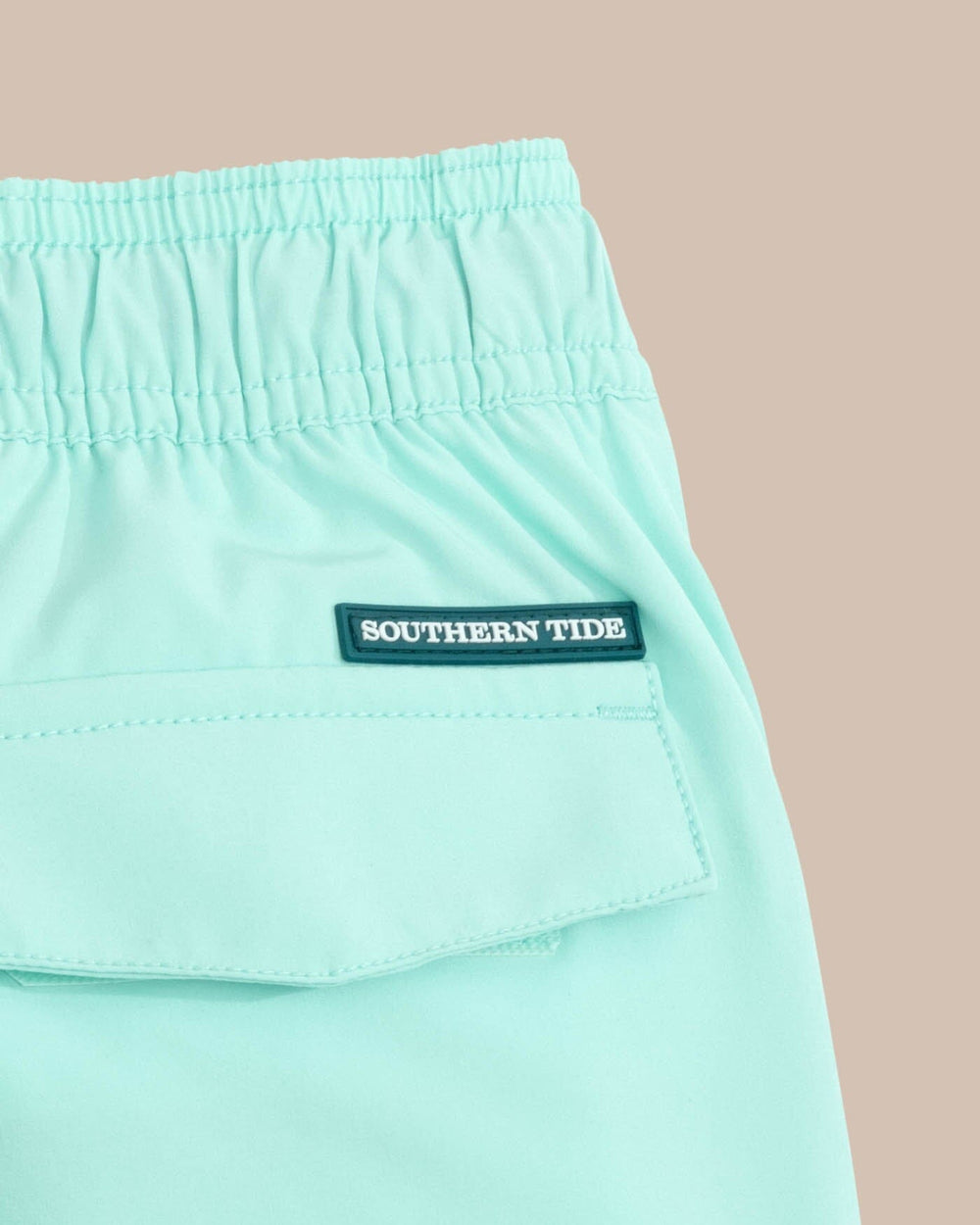 The detail view of the Southern Tide boys-solid-swim-trunk-2-1 by Southern Tide - Wake Blue
