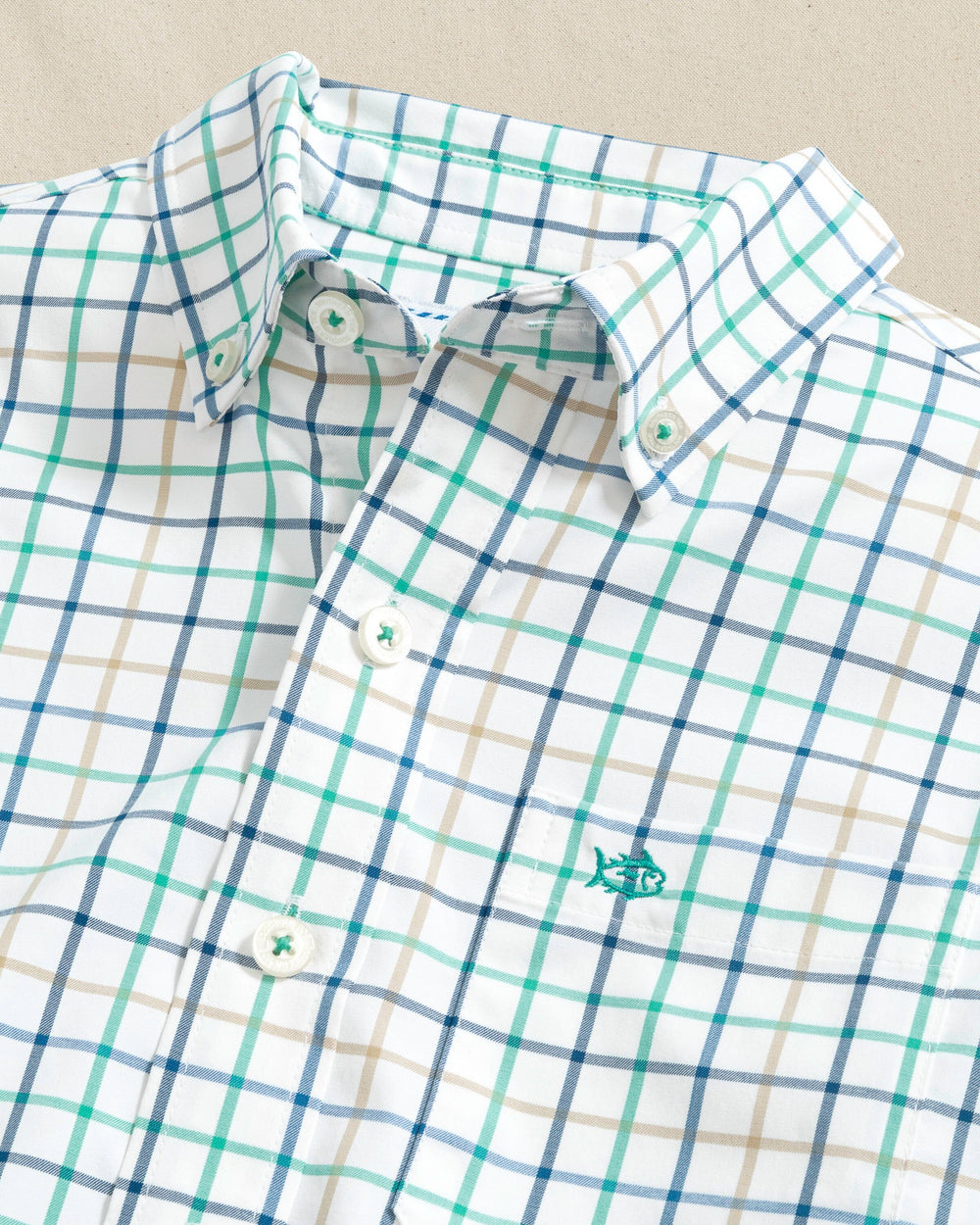 The detail view of the Southern Tide Boys Tradewind Tattersal Skipjack Sport Shirt by Southern Tide - Persian Green