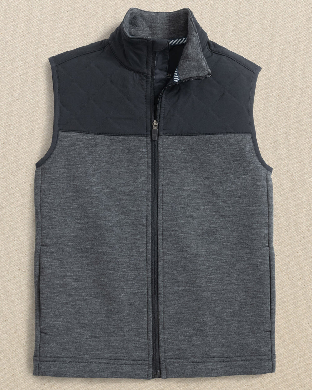 The front view of the Southern Tide Boys Waterfront Quilted Vest by Southern Tide - Caviar Black