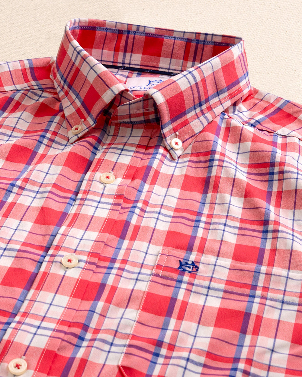 The detail view of the Southern Tide Breakwater Plaid brrr°® Intercoastal Long Sleeve Sport Shirt by Southern Tide - Snapper