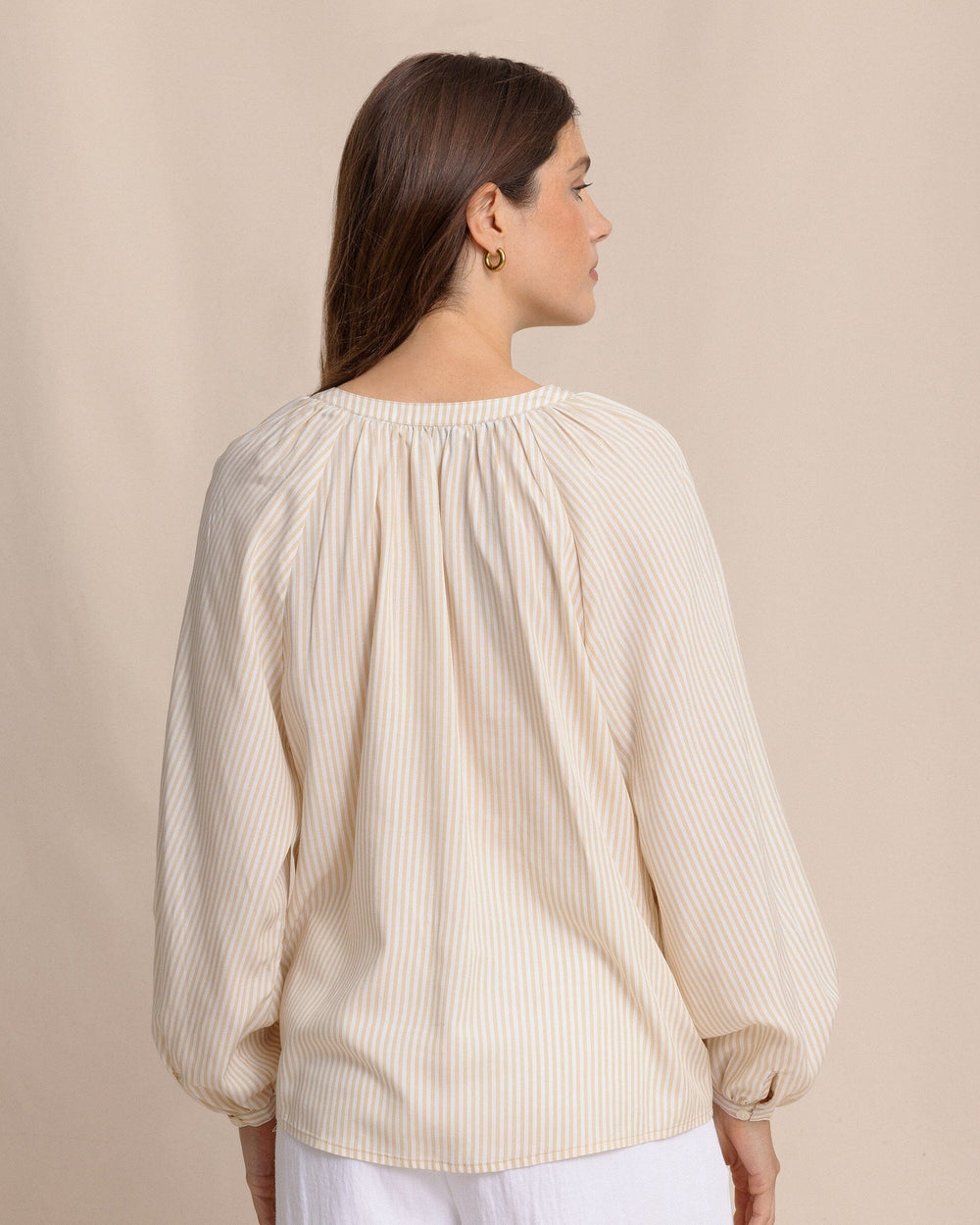 The back view of the Southern Tide Brinley Band Collar Button Down Shirt by Southern Tide - Sandcastle Khaki