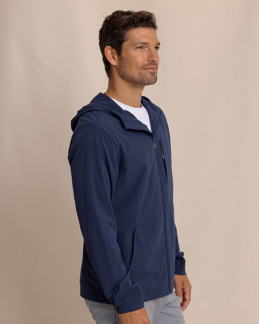 The side view of the Southern Tide Brookview Performance Jacket by Southern Tide - Dress Blue