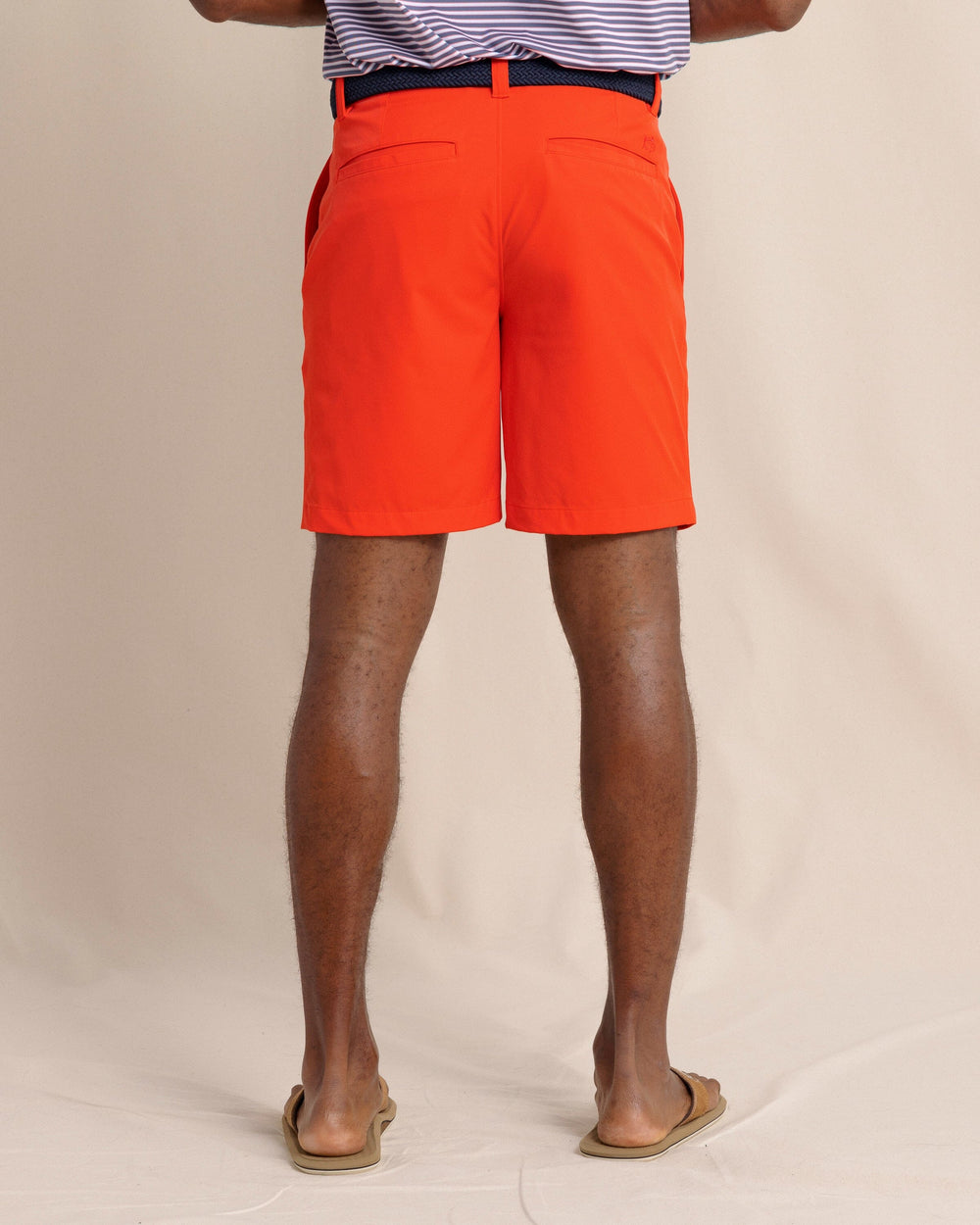The back view of the Southern Tide brrr°®-die 8" Performance Short in Poppy Red by Southern Tide - Poppy Red