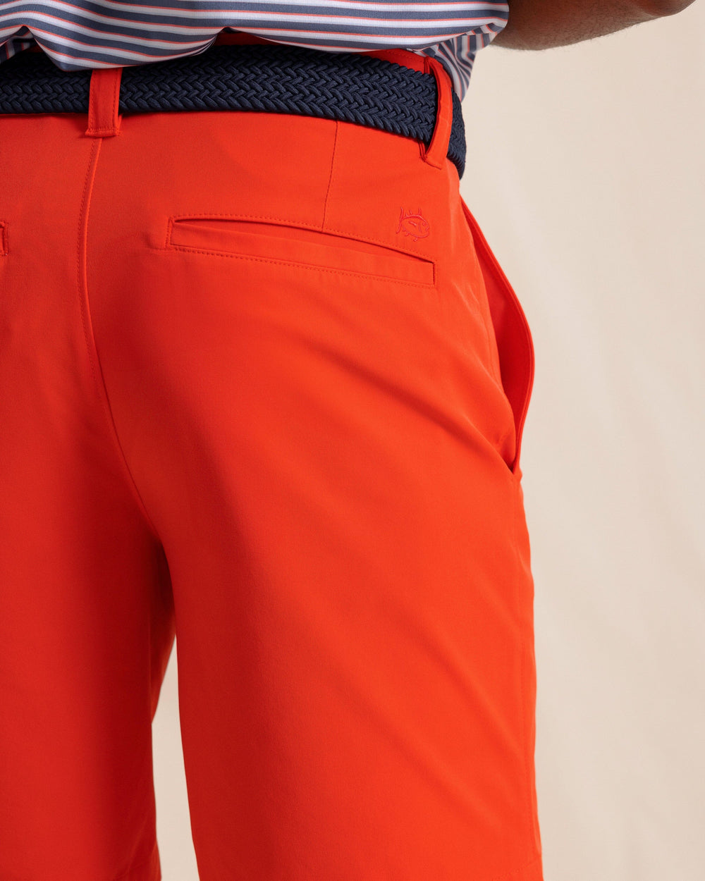 The back detail view of the Southern Tide brrr°®-die 8" Performance Short in Poppy Red by Southern Tide - Poppy Red