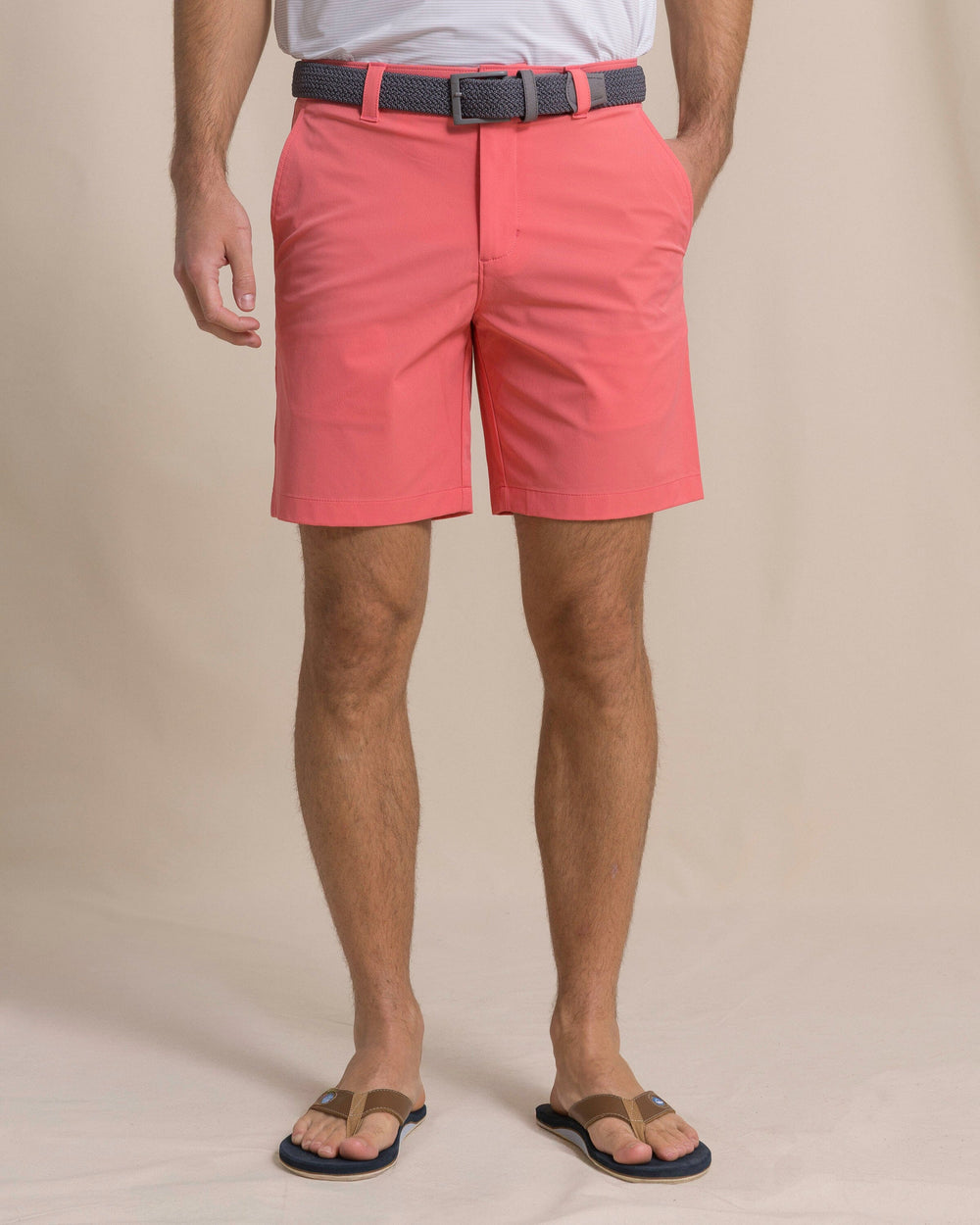 The front view of the Southern Tide brrr°®-die 8" Performance Short in Sunkist Coral by Southern Tide - Sunkist Coral