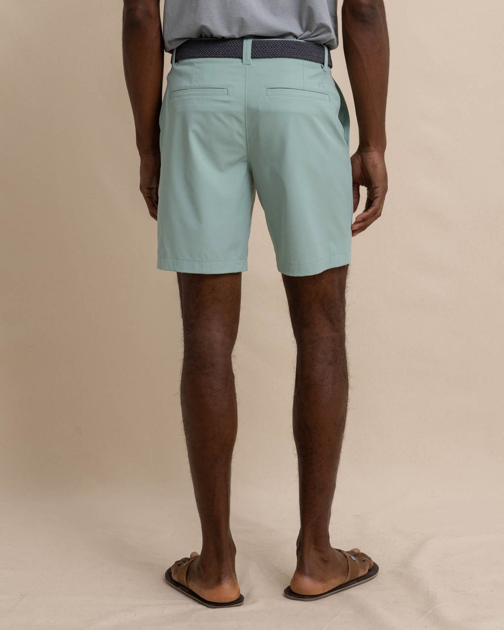 The back view of the Southern Tide brrr die 8 performance short by Southern Tide - Green Surf