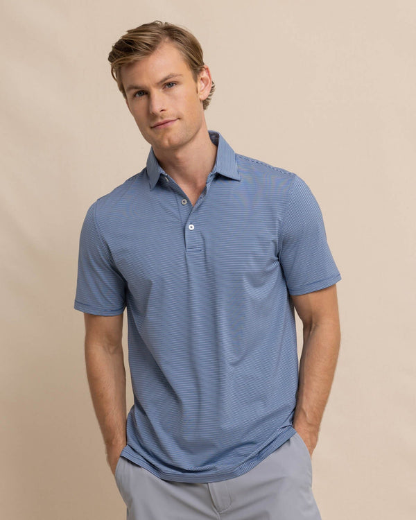 The front view of the Southern Tide brrr-eeze Baytop Stripe Performance Polo by Southern Tide - Aged Denim