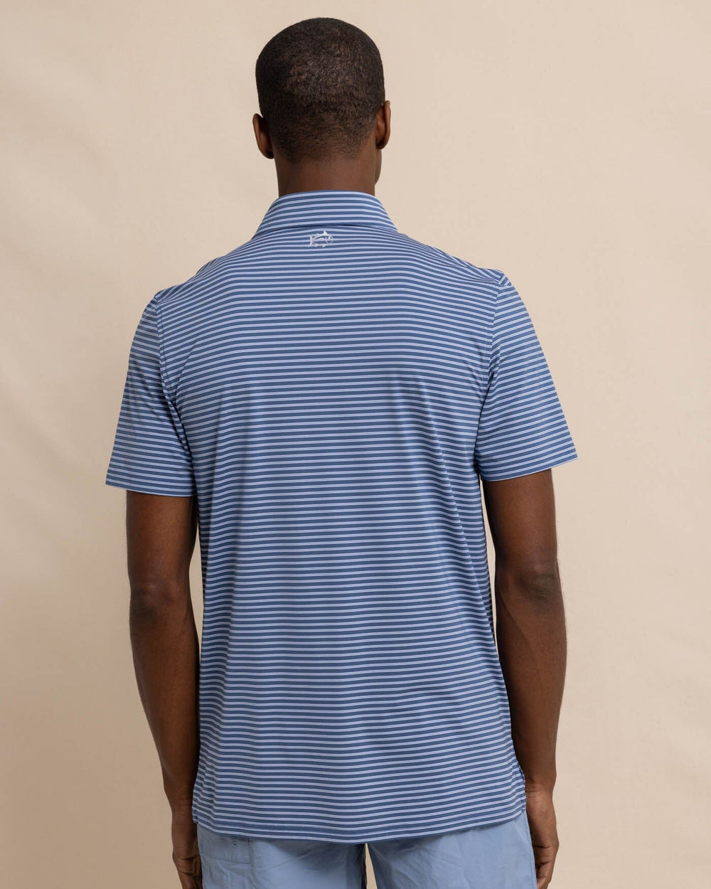 The back view of the Southern Tide brrr eeze Beattie Stripe Performance Polo by Southern Tide - Aged Denim