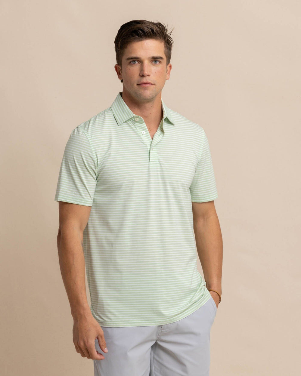The front view of the Southern Tide brrr eeze Beattie Stripe Performance Polo by Southern Tide - Smoke Green