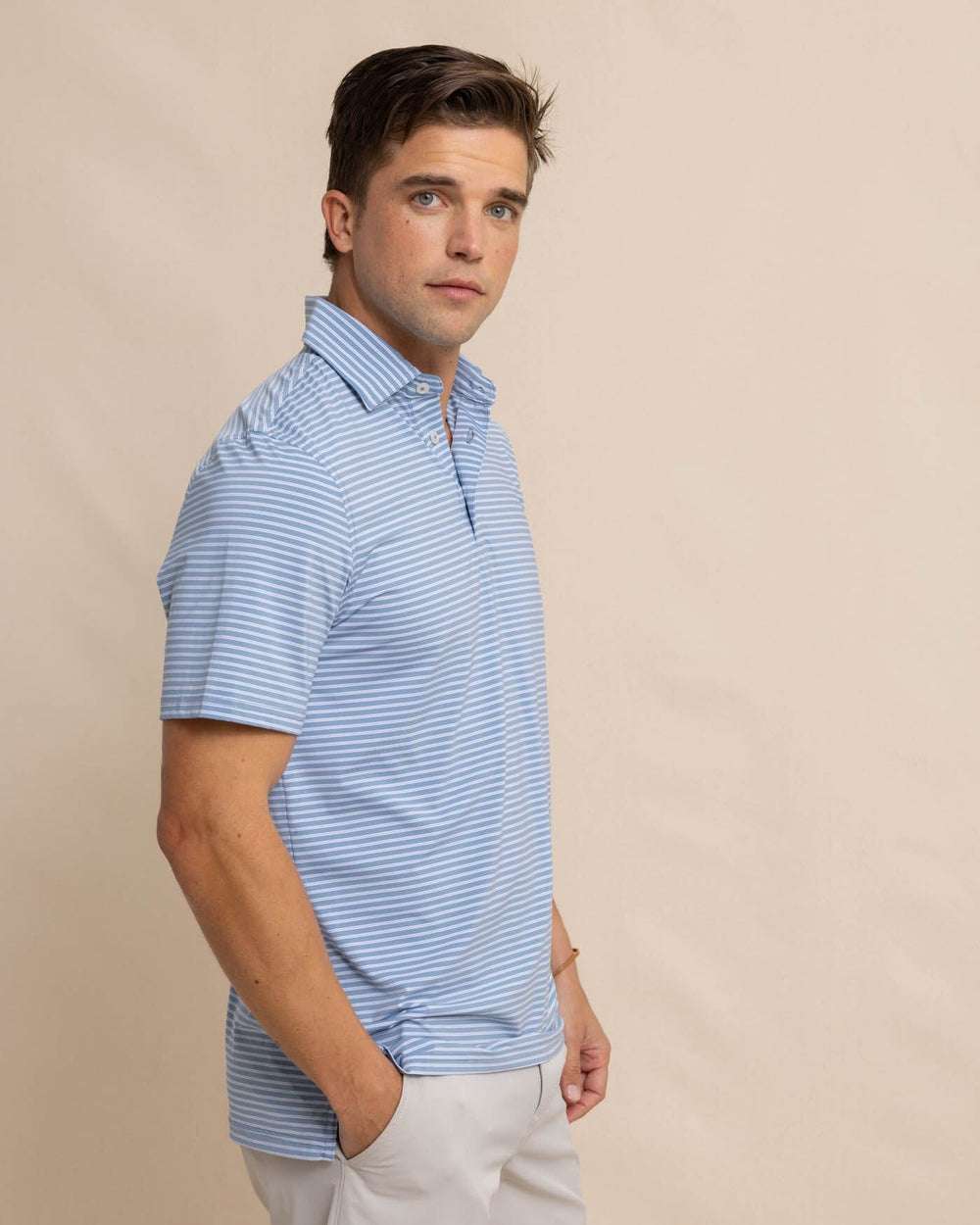 The front view of the Southern Tide brrr eeze Beattie Stripe Performance Polo by Southern Tide - Windward Blue