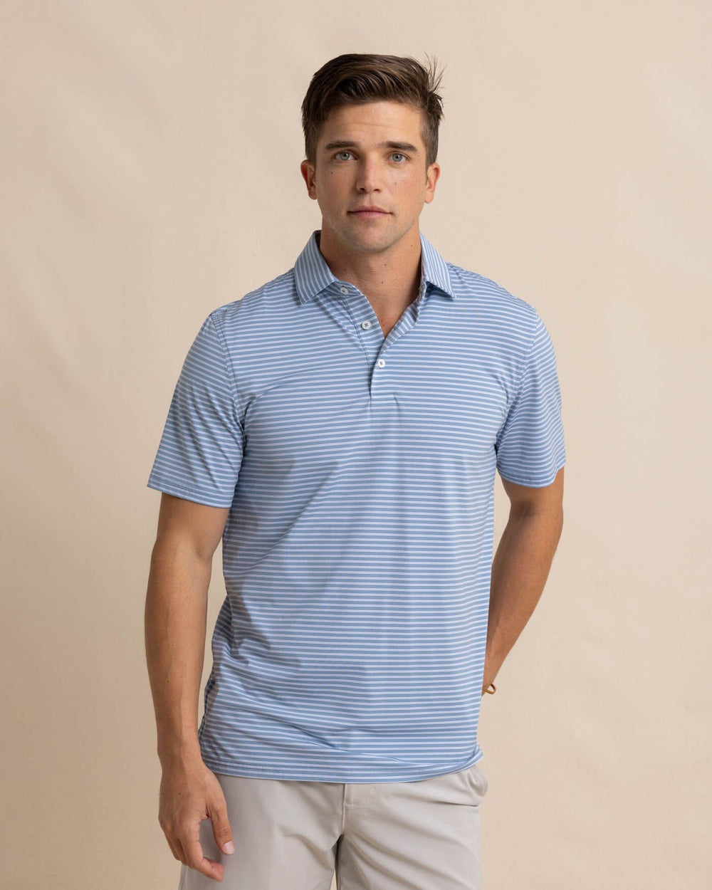 The front view of the Southern Tide brrr eeze Beattie Stripe Performance Polo by Southern Tide - Windward Blue