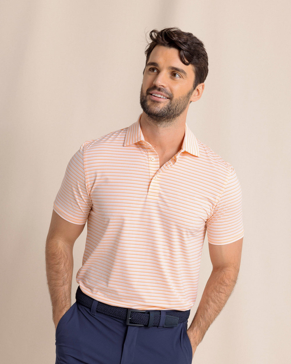 The front view of the Southern Tide brrr°®-eeze Breezy Point Stripe Polo by Southern Tide - Cantaloupe