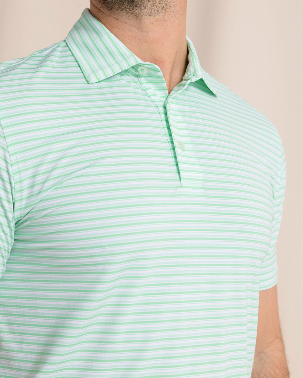 The front detail view of the Southern Tide brrr°®-eeze Breezy Point Stripe Polo by Southern Tide - Parakeet