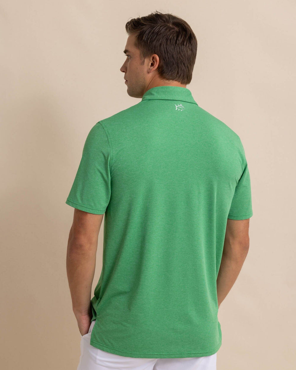 The back view of the Southern Tide brrr-eeze-heather-performance-polo-shirt by Southern Tide - Heather Kelly Green