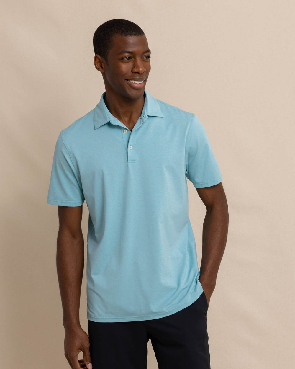 The front view of the Southern Tide brrr eeze Heather Performance Polo Shirt by Southern Tide - Heather Marine Blue