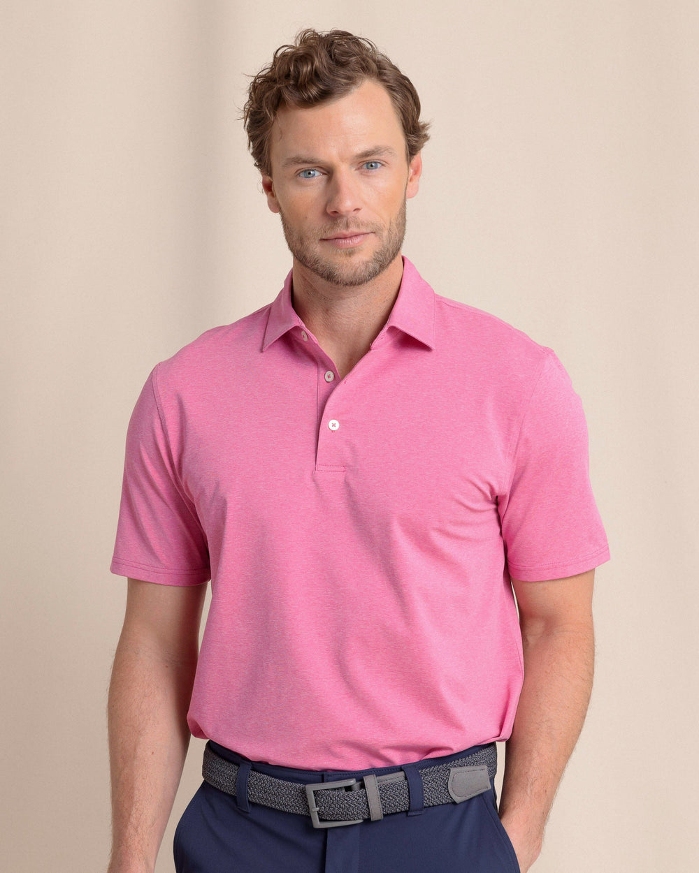 The front view of the Southern Tide brrr°®-eeze Heather Performance Polo Shirt by Southern Tide - Heather Very Berry