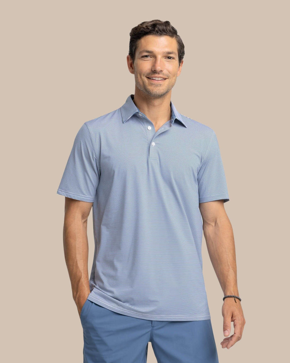 The front view of the Southern Tide brrr-eeze Meadowbrook Stripe Polo by Southern Tide - Aged Denim