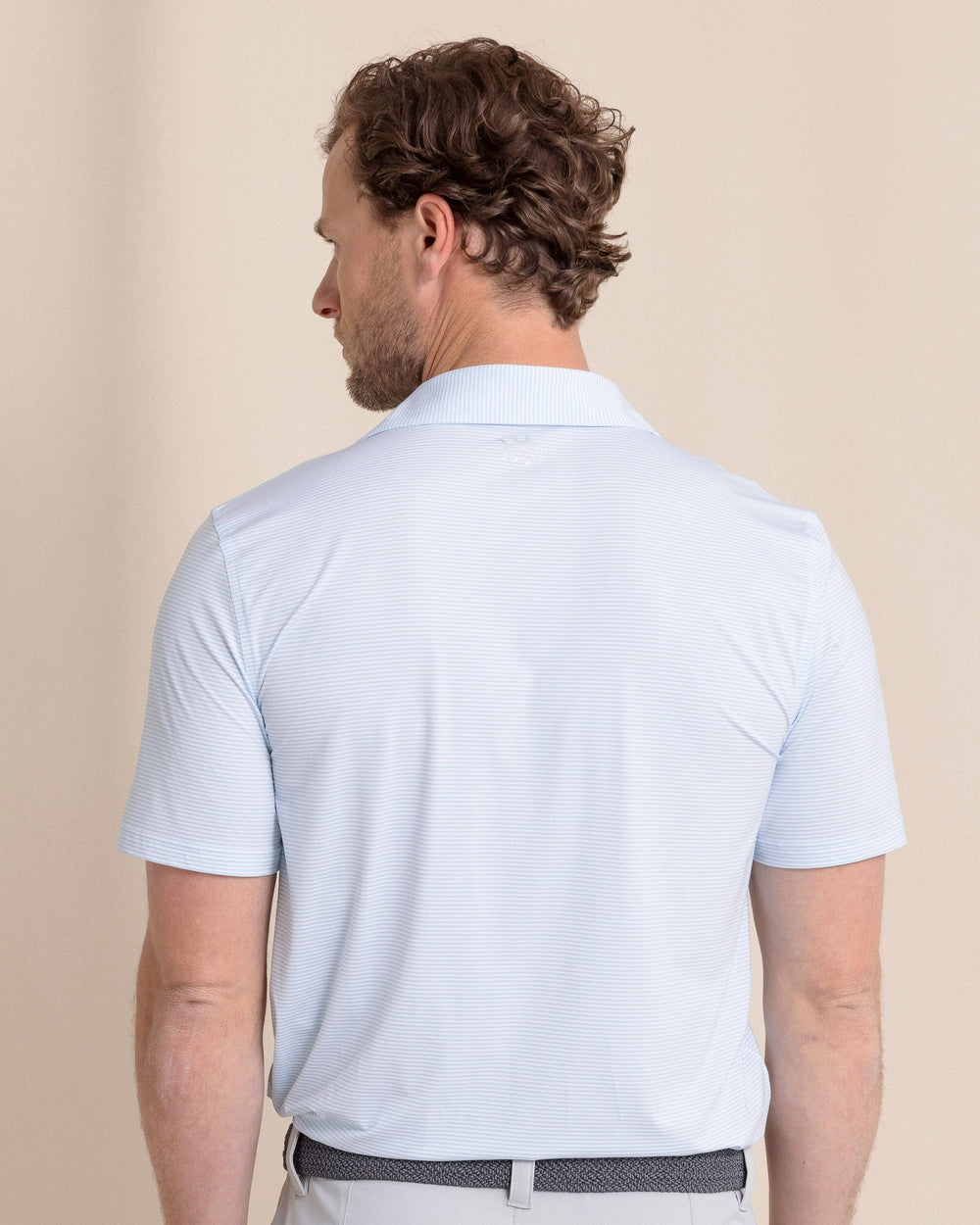 The back view of the Southern Tide brrr-eeze Meadowbrook Stripe Polo by Southern Tide - Clearwater Blue