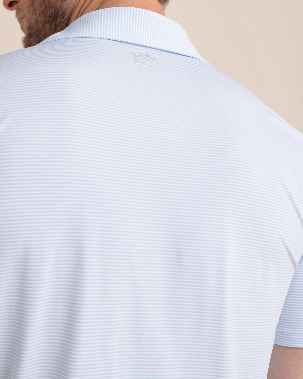 The back detail view of the Southern Tide brrr-eeze Meadowbrook Stripe Polo by Southern Tide - Clearwater Blue