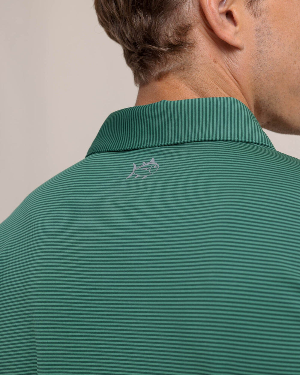 The detail view of the Southern Tide brrr-eeze Meadowbrook Stripe Polo by Southern Tide - Fir