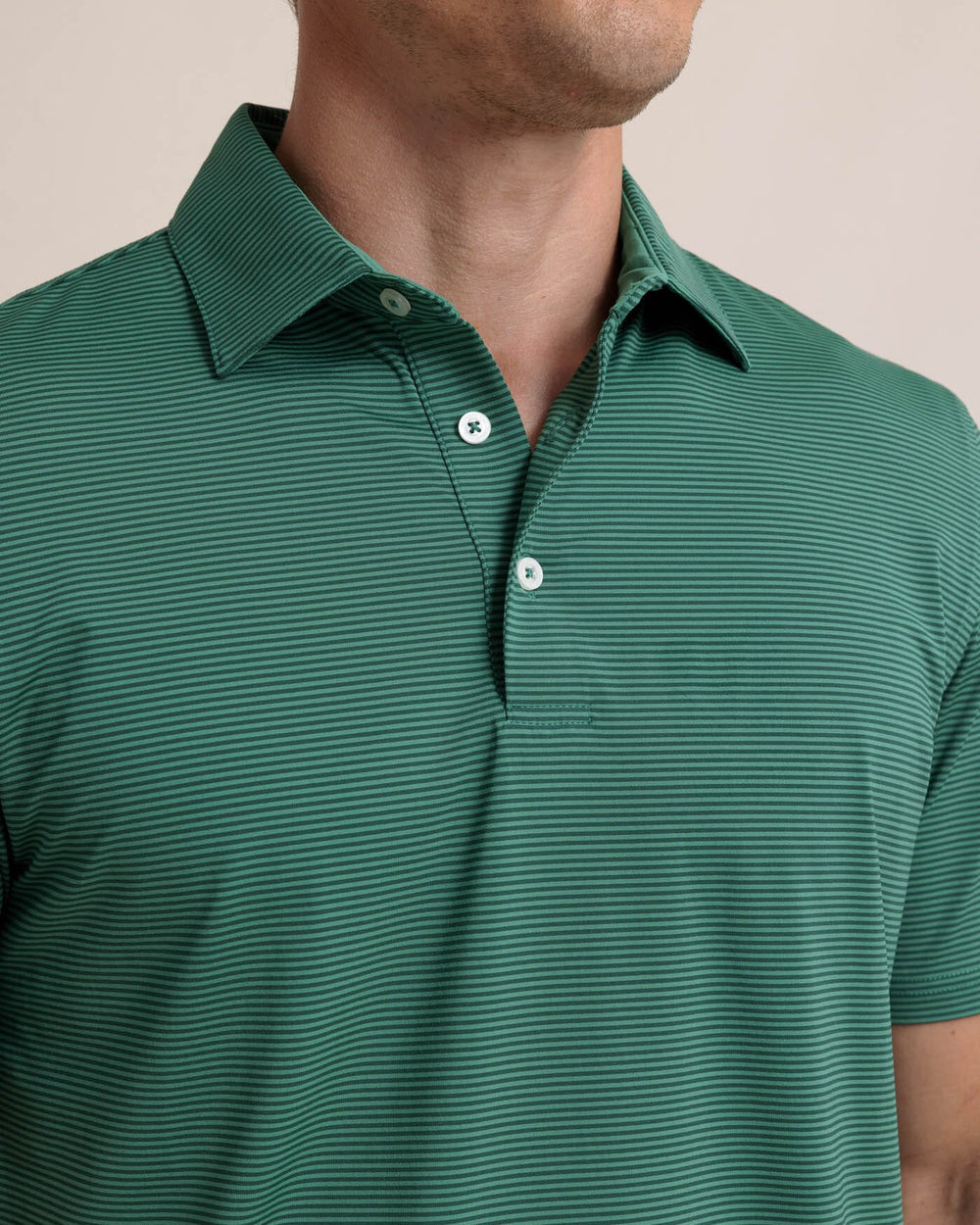 The detail view of the Southern Tide brrr-eeze Meadowbrook Stripe Polo by Southern Tide - Fir