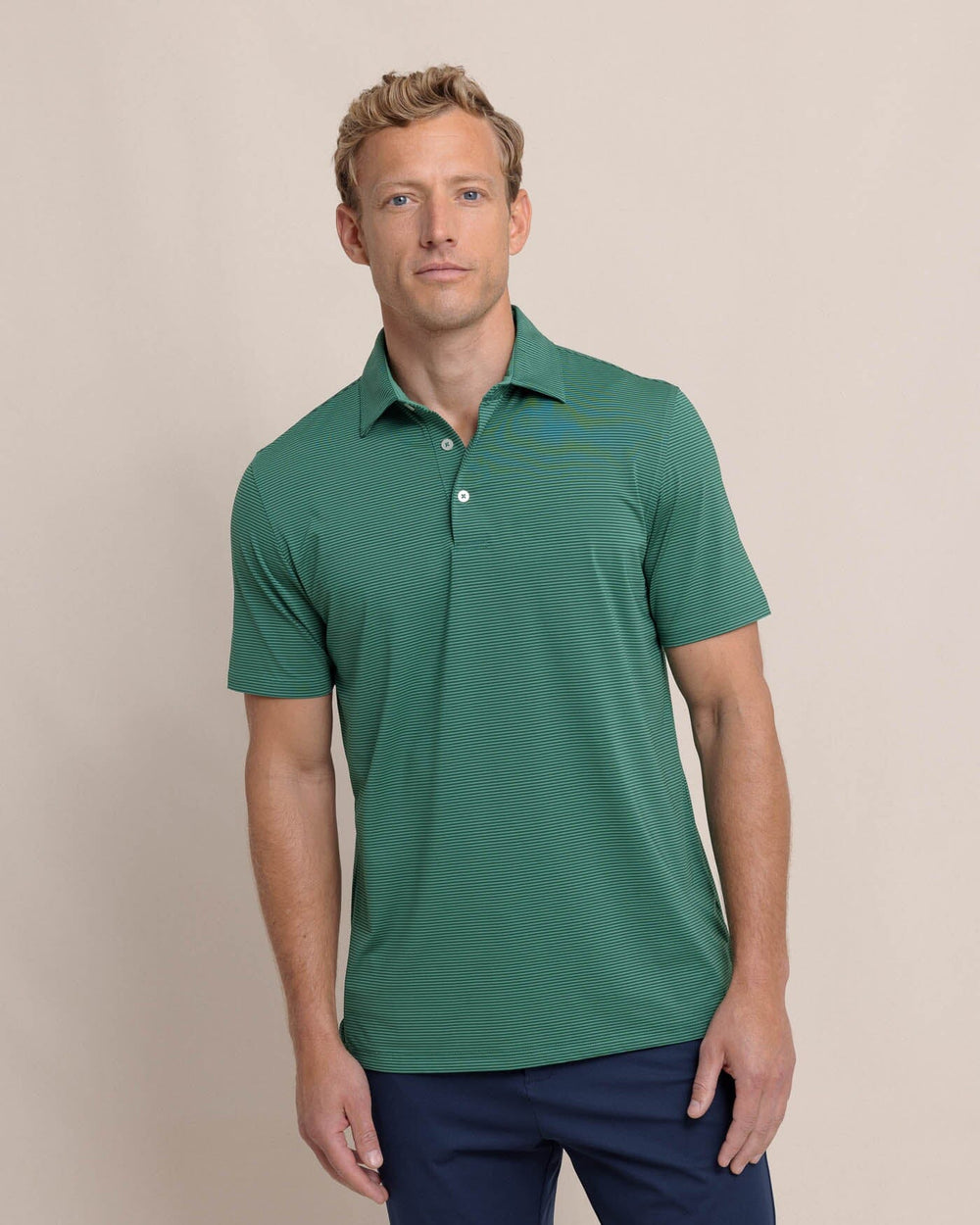 The front view of the Southern Tide brrr-eeze Meadowbrook Stripe Polo by Southern Tide - Fir