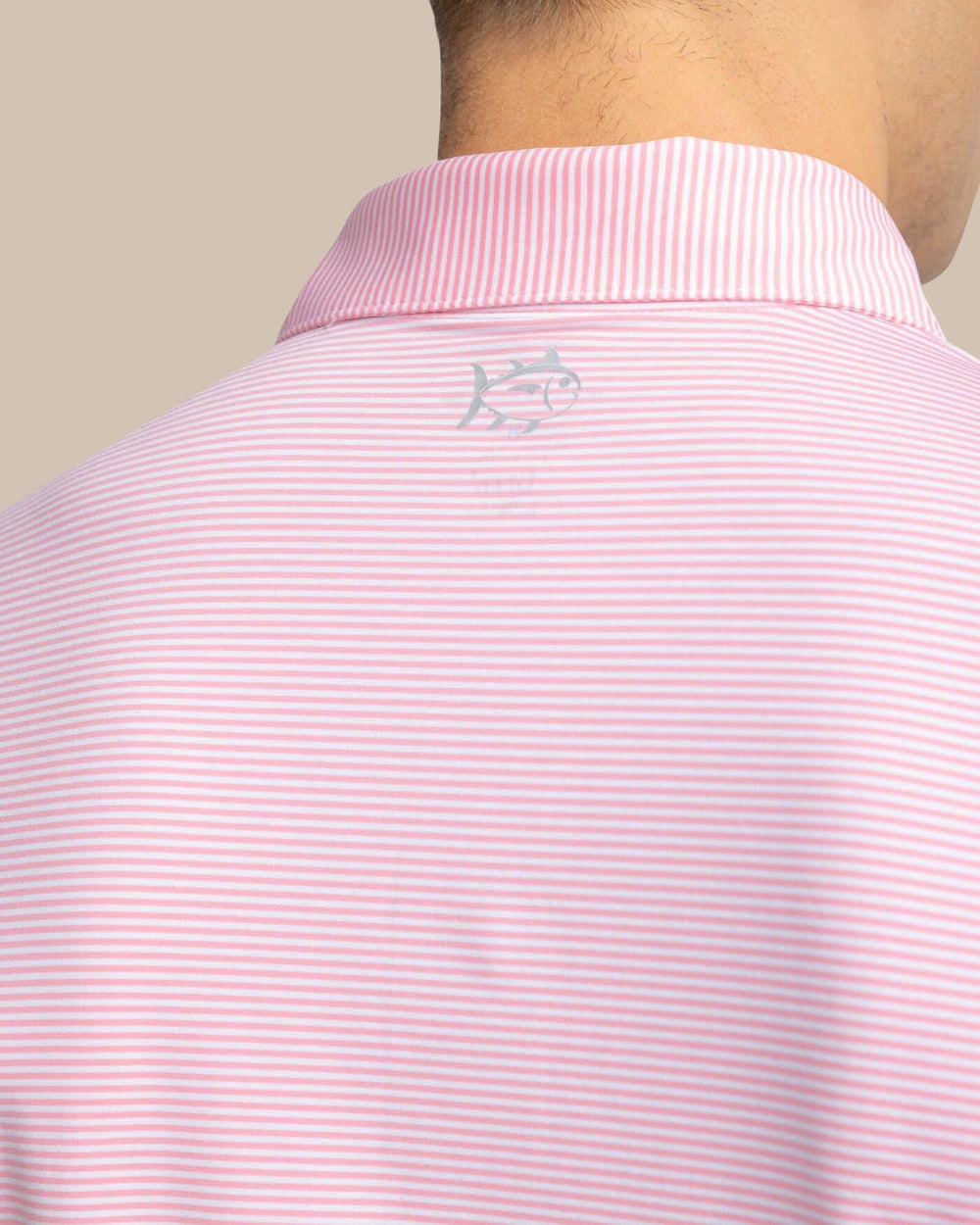 The detail view of the Southern Tide brrr-eeze Meadowbrook Stripe Polo by Southern Tide - Geranium Pink