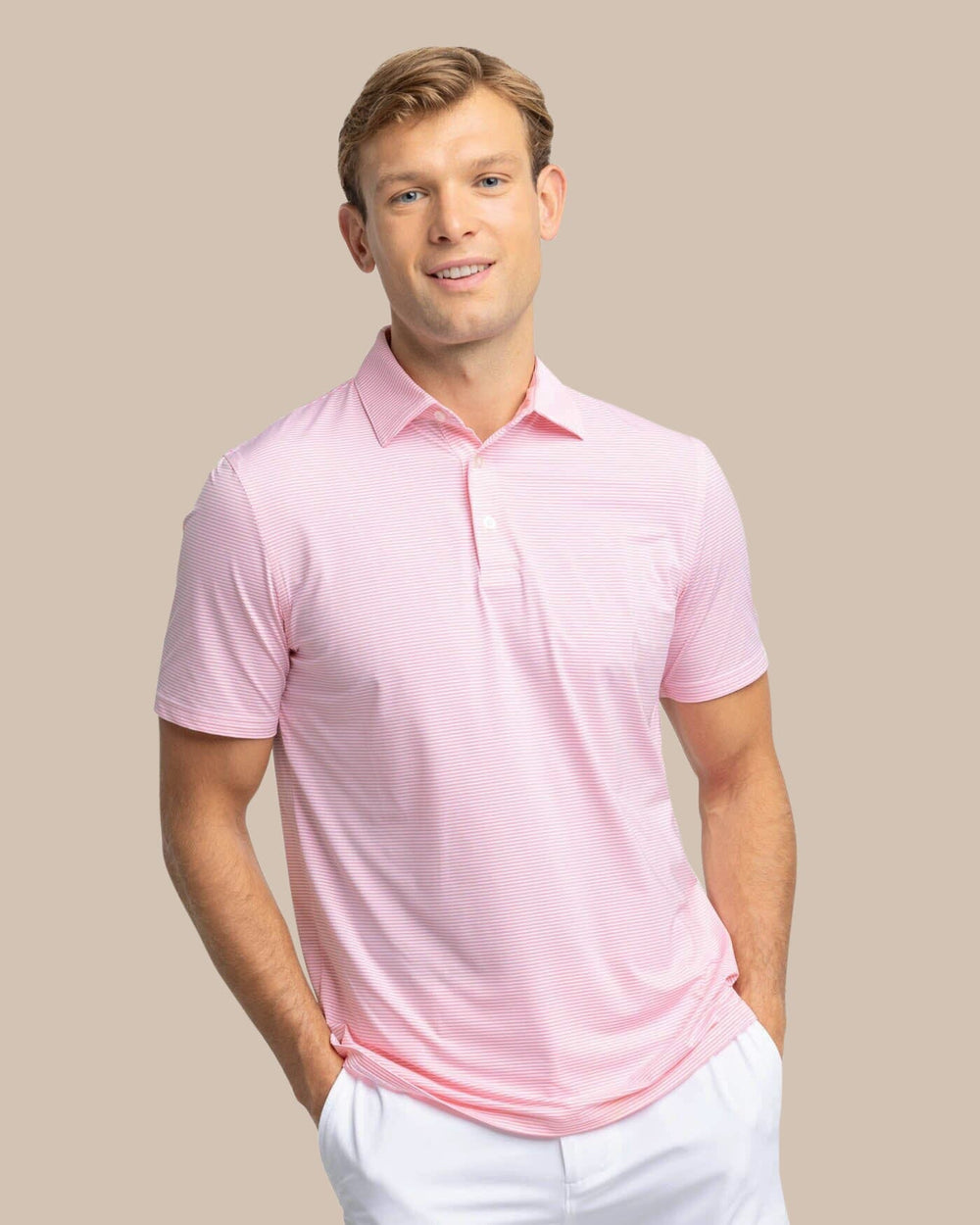 The front view of the Southern Tide brrr-eeze Meadowbrook Stripe Polo by Southern Tide - Geranium Pink
