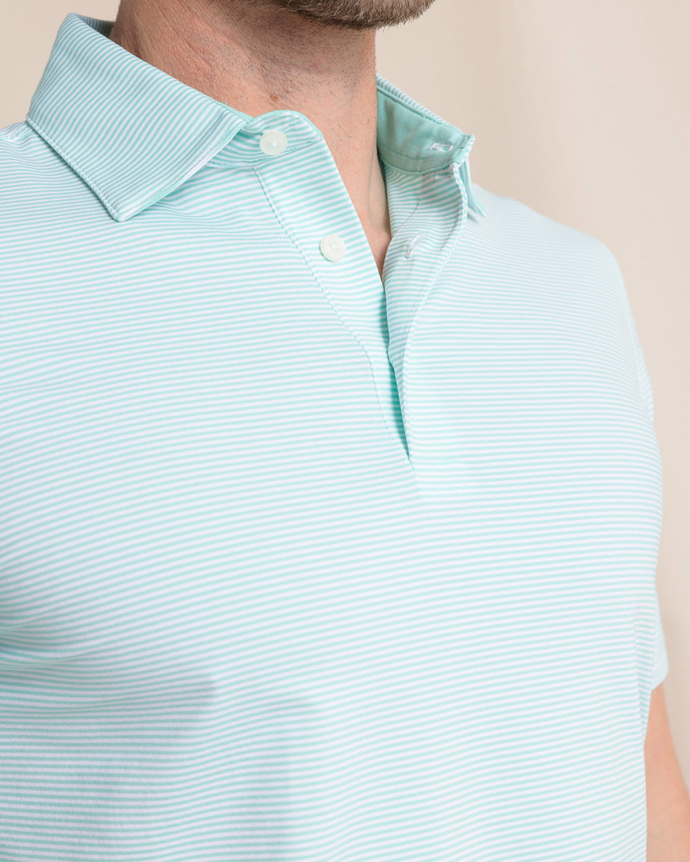 The detail view of the Southern Tide brrr°®-eeze Meadowbrook Stripe Polo by Southern Tide - Mint