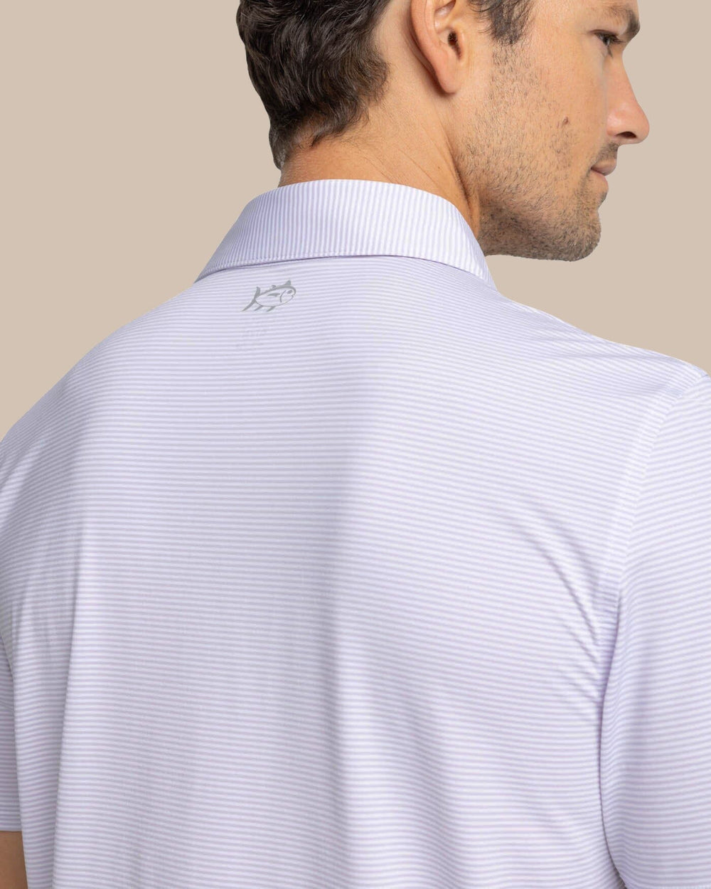The detail view of the Southern Tide brrr-eeze Meadowbrook Stripe Polo by Southern Tide - Orchid Petal