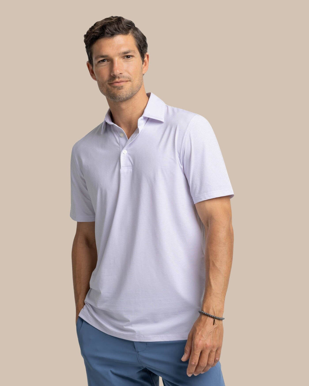The front view of the Southern Tide brrr-eeze Meadowbrook Stripe Polo by Southern Tide - Orchid Petal