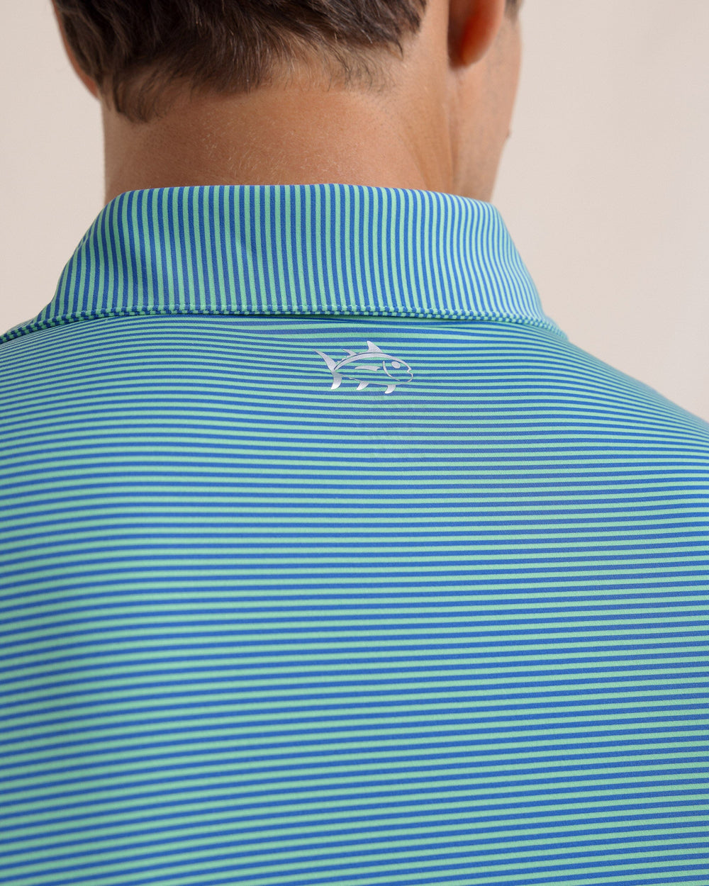 The back detail view of the Southern Tide brrr-eeze Meadowbrook Stripe Polo by Southern Tide - Parakeet