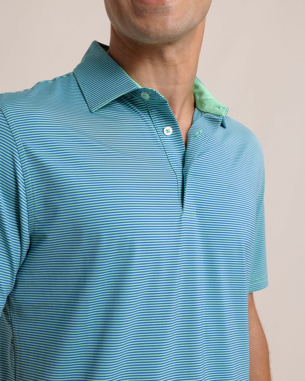 The detail view of the Southern Tide brrr-eeze Meadowbrook Stripe Polo by Southern Tide - Parakeet